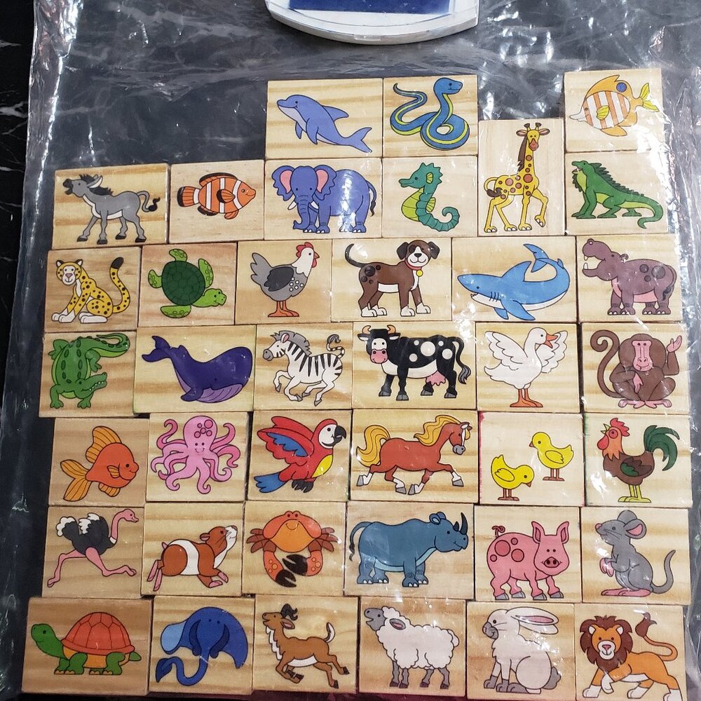 39 Stamps, Variety of Animals. One ink pad.4+